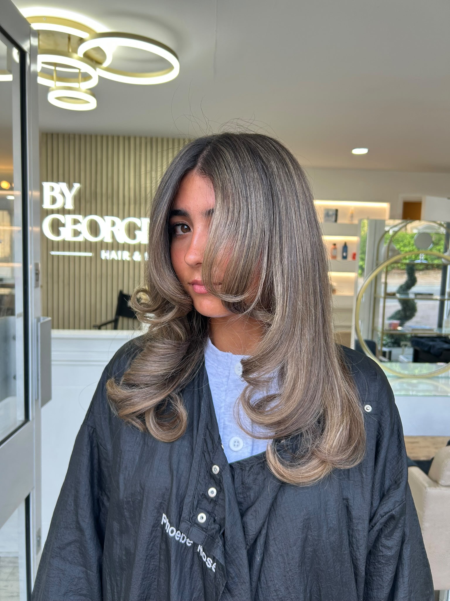 Mushroom brunette balayage with soft curled layers