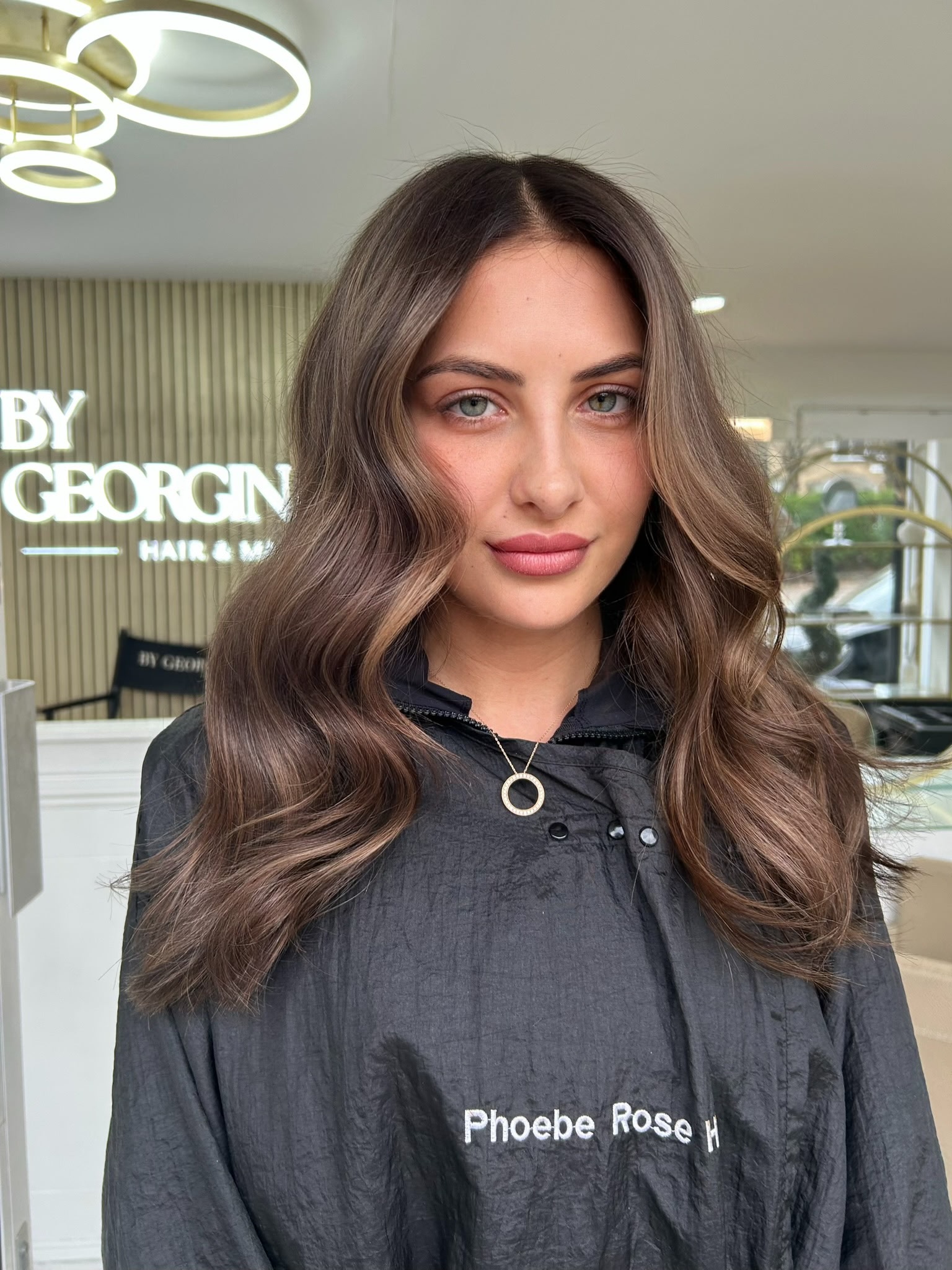 Glossy brunette colour with soft waves