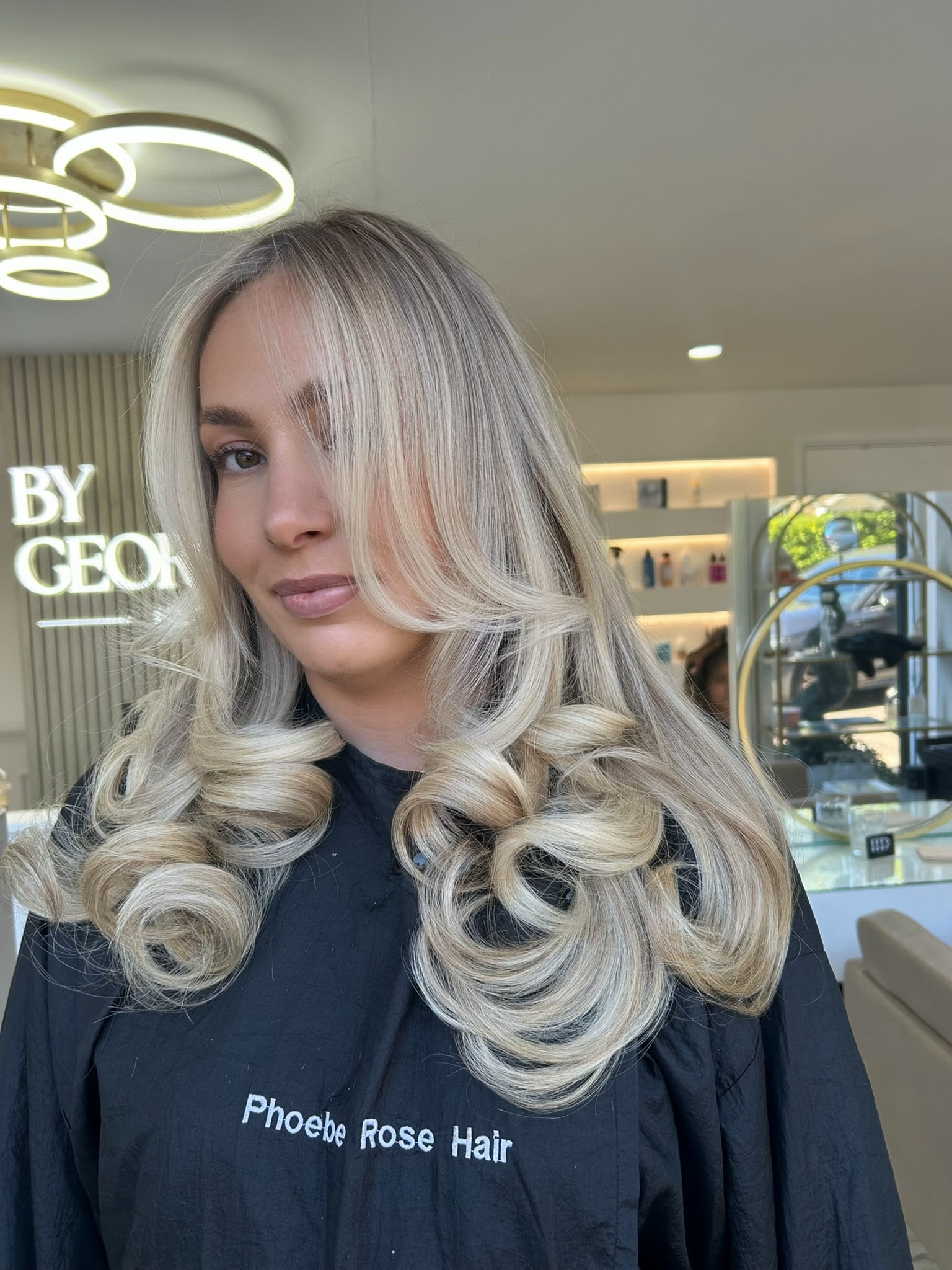 Cool blonde curls with a smooth bright finish